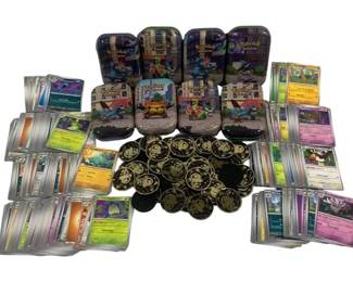 7245 - 334 Pokemon Cards, Coins & 8 Metal Tins