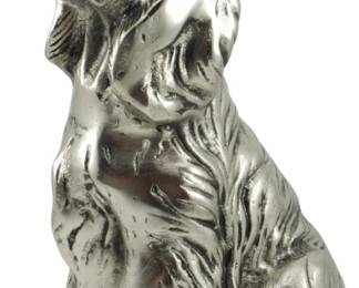 115 - Silver-Tone Metal Dog Figure 13.5" (Description): A charming silver-tone metal dog figure  depicting a seated hound, likely a Basset  Hound or Beagle, with expressive features and  floppy ears. The figure has a polished  metallic finish with a vintage appeal. Measures 13.5 inches in height.