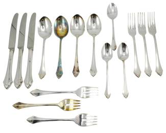 276 - Oneida Community Stainless Group of Flatware (Description): Oneida Community stainless steel flatware set  featuring a coordinated pattern with  decorative finials. The set includes dinner  knives, tablespoons, dinner forks, teaspoons,  and salad or dessert forks. The pieces display a classic design with elegant  detailing at the handle terminals.