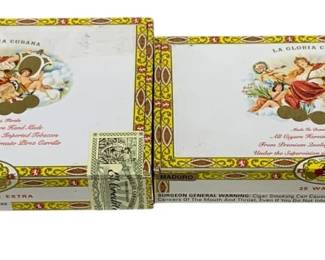 2359 - 2 La Gloria Cubana Cigar Boxes (Description): Two La Gloria Cubana cigar boxes. Each box  measures 10 inches by 5.5 inches by 2 inches.
