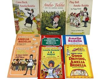 2003 - 9 Amelia Bedelia Books (Description): A collection of nine Amelia Bedelia books.  This lot features various titles from the  beloved children's book series about the  literal-minded housekeeper, including works  by Peggy Parish and Herman Parish.