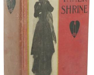 27 - 1909 May Edition The Inner Shrine (Description): The Inner Shrine, May Edition from 1909,  published by Grosset & Dunlap. This hardcover  book features a striking red cover with a  photographic illustration of a woman in  Victorian dress and decorative heart motifs. The spine displays the title and publisher  name with matching design elements.