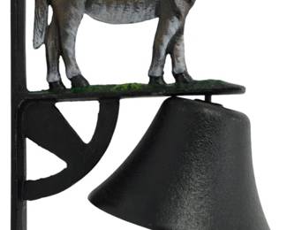 163 - Cast Iron Donkey Bell 13"x8" (Description): Cast iron donkey bell featuring a  wall-mounted bracket design. The decorative  piece showcases a painted donkey figure  standing atop a platform with green patina  accents, positioned above a traditional black bell with interior clapper. The bracket  allows for easy wall installation. Measures  13 inches by 8 inches.