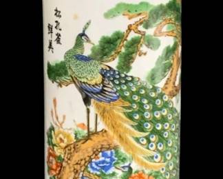 2307 - F.S. Louie Berkeley Vase 8.5" (Description): A porcelain vase by F.S. Louie of Berkeley,  featuring hand-painted decoration with  peacocks, peonies, and pine branches in the  Chinese tradition, with Chinese calligraphy  on the front. Measures 8.5 inches tall.