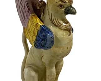 2110 - Raffaellesco Griffin Candleholder 8" (Description): Raffaellesco candleholder featuring a winged  griffin figure in traditional Italian  majolica style. Measures 8 inches tall.