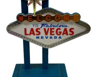 2007 - Lighted Las Vegas Sign - No Power Cord (Description): Lighted Las Vegas Sign featuring the iconic  "Welcome to Fabulous Las Vegas Nevada"  design. No power cord included. 13 x 9 x 5 Used as is electric/electronic/mechanical  item. No guarantee all components, untested.