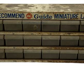 7341 - AC Delco Guide Miniature Lamps 18-Drawer Organizer (Description): Commonly used in auto repair shops and gas  stations for storing small replacement  lightbulbs 19 x 9 x 6