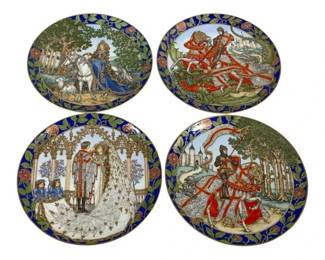 2043 - 4 Legend of St. George Plates (Description): A four-piece set of Legend of St. George  collector plates. Each plate measures 8  inches round and features detailed scenes  from the legend of St. George, with  decorative borders featuring roses and leafy vine motifs on a blue ground.