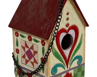 2326 - Jim Shore Birdhouse 8"x4.5"x4" (Description): Jim Shore birdhouse featuring the artist's  signature folk art style with hand-painted  decorative details. Measures 8 inches by 4.5  inches by 4 inches.