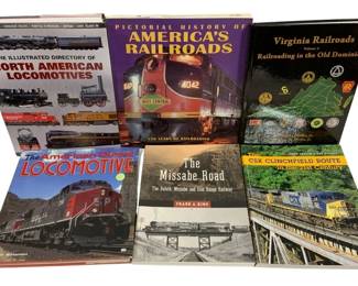 1067 - 6 Train & Railroad Books (Description): A collection of five train books covering  various aspects of American railroading. The  lot includes titles on North American  locomotives, the pictorial history of  America's railroads, Virginia railroads, the American diesel locomotive, the Missabe Road,  and the CSX Clinchfield Route.