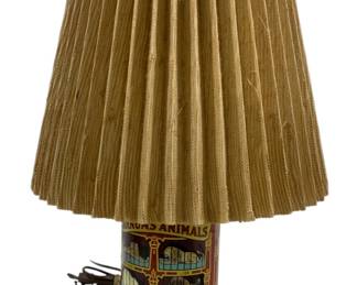 7197 - Animal Cracker Tin Lamp - 17.5" Tall (Description): Used as is electric/electronic/mechanical  item. No guarantee all components, untested.