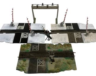 1057 - Lot of HO Scale Crossings (Description): A lot of HO scale brass crossing bridge  pieces. These model railroad accessories  include detailed crossing sections with  signal elements suitable for HO scale  layouts.