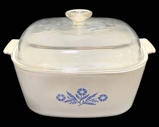 2042 - Corningware Dish w/ Lid 4 Quarts (Description): Corningware dish with lid in the 4 quart  size. Features the classic Cornflower Blue  pattern on white Pyroceram material. Includes  original glass lid with knob handle.