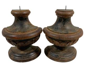 2462 - Pair Candle Prickets 9" tall (Description): A set of two candleholders measuring 9 inches  tall. These turned wooden candleholders  feature a classic urn-shaped design with  carved petal detailing around the bowl and  stepped circular bases. Each holder has a metal pricket spike at the top for securing  candles.