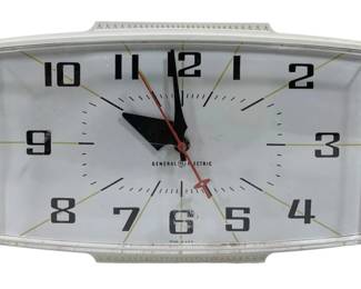 327 - White GE Electric Wall Clock - 8.5 x 5.5 (Description): Used as is electric/electronic/mechanical  item. No guarantee all components, untested.
