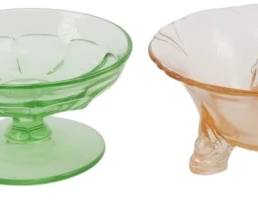 757 - 4 Assorted Vintage Heisey Glass Pieces (Description): A collection of four assorted vintage Heisey  glass pieces. The grouping includes a pink  depression glass bowl, a green footed compote  or sherbet dish, a pink footed bowl with  scalloped rim, and a yellow ribbed glass dish. Each piece showcases the quality  craftsmanship characteristic of Heisey  glassware.