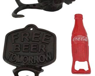 178 - 3 Cast Iron Items with Coca-Cola Opener (Description): Three vintage cast iron items including a  wall-mounted bottle opener with "Free Beer  Tomorrow" text, a red painted Coca-Cola  bottle-shaped bottle opener marked "Drink  Coca-Cola," and a decorative rooster-form wall hook. All pieces feature rustic iron  construction with traditional designs.