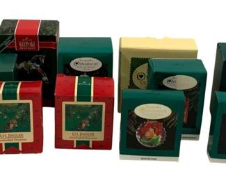 2315 - 10 Hallmark Keepsake Ornaments (Description): A collection of ten Hallmark ornaments in  their original boxes. The lot includes  various Keepsake Ornament Collector's Club  editions and miniature ornaments, featuring  assorted holiday designs.