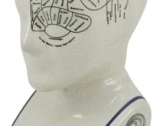 123 - L.N. Fowler Phrenology Head Figure 9" (Description): Ceramic phrenology head figure by L.N.  Fowler. This decorative bust features a  detailed map of the human skull divided into  labeled sections representing various mental  faculties and personality traits according to 19th century phrenological theory. The  cream-colored ceramic has an attractive  crackle glaze finish with blue text and  illustrations. The base is marked "Phrenology  by L.N. Fowler" and "Entered at Stationers