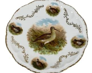 2055 - Antique Bird Plate 9" Round (Description): Antique bird plate featuring decorative avian  motifs. The plate measures 9 inches round.