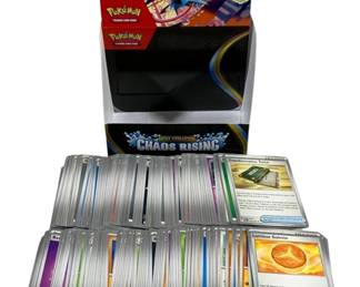 2379 - 200 Pokemon Cards w/ Box (Description): A lot of 200 Pokemon trading cards  accompanied by a decorative storage box. The  collection includes various card types from  the Pokemon Trading Card Game series.