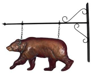 196 - Metal Bear Hanging Trade Shingle w/ Bracket (Description): The three dimensional bear figure displays a  rich copper patina with verdigris accents and  is suspended by chains from a decorative  iron arrow-style rod. The scrollwork wall  bracket provides traditional appeal suitable for storefront or home display. Measures 22"  x 28".