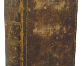 39 - 1826 Boston Edition Reference Bible (Description): An 1826 Boston Edition Reference Bible bound  in leather. The volume features a traditional  binding with raised bands on the spine and  gilt ruling. The leather shows considerable  age-related wear with patina, scuffing, and areas of discoloration consistent with its  nearly 200 years of age.