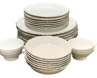 2376 - 24 pc Harmony House "Darlene" China (Description): A 24-piece set of Harmony House china in the  "Darlene" pattern. This elegant dinnerware  set features a classic white design with  refined detailing, representative of the  Harmony House line's timeless appeal.
