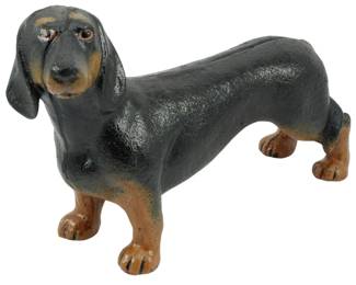 127 - Cast Iron Dachshund Figure 6.5"x9"x3" (Description): Cast iron dachshund figure with details in  black and tan coloring, capturing the breed's  characteristic long body and short legs.  Measures 6.5" x 9" x 3".
