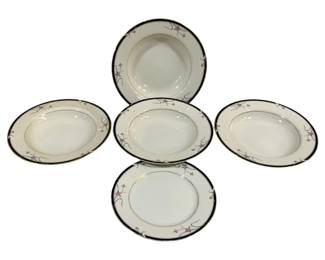 2347 - 5 Mikasa Ivory China Plates (Description): A five-piece set of Mikasa "Ivory China"  plates featuring an elegant design with  delicate floral accents and dark trim along  the rims. The plates range in size from 7.5  to 8.5 inches in diameter.