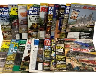 1050 - 20 Train Magazines (Description): A collection of twenty train magazines  covering various aspects of model railroading  and train hobbies.
