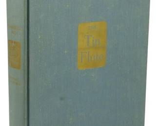 55 - 1947 First Edition The Tin Flute (Description): First edition of The Tin Flute, published in  1947. This novel by Gabrielle Roy is  presented in a blue cloth hardcover binding  with gilt title lettering on the front cover  and spine. The book shows some age-related spotting to the cloth boards consistent with  its vintage.