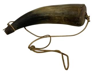 2098 - Antique Powder Horn 9" (Description): Antique powder horn with leather carrying  strap. Measures 9 inches in length.