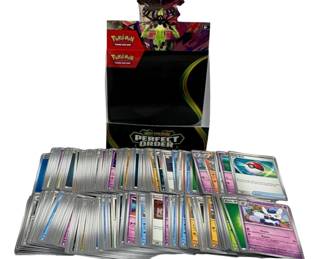 2380 - 250 Pokemon Cards w/ Box (Description): A lot of 250 Pokemon trading cards  accompanied by a Pokemon box. The collection  includes various Pokemon cards suitable for  collectors and players alike.