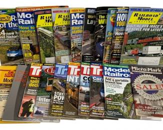 1048 - 20 Train Magazines (Description): A collection of 20 train magazines featuring  various titles dedicated to model railroading  and train enthusiasts.