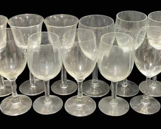2018 - 13 Assorted Wine Glasses 7" (Description): A collection of thirteen wine glasses in  assorted styles. The glasses measure 7 inches  in height.