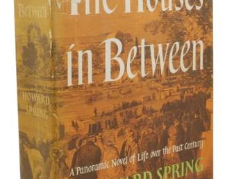 49 - 1951 1st Ed The Houses in Between w/ DJ (Description): First edition of The Houses in Between by  Howard Spring, published in 1951. This copy  retains its original dust jacket, which  features a panoramic Victorian scene on the  front cover. The dust jacket shows some wear including a torn section at the lower spine  area. The book is described on the jacket as  'A Panoramic Novel of Life over the Past  Century' by the author of 'My Son, My Son'  and 'There Is No Armour.'