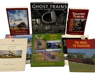 1068 - Collection of Railroad & Train Books (Description): A collection of railroad and train themed  books including Ghost Trains: Images from  America's Railroad Heritage, Tourist Trains  2004, Chasing the Powhatan Arrow by Michael  Abraham, America's Bicentennial Queen Engine 4449 'The Lone Survivor' by Richard K.  Wright, Trackside Duluth 1955-1965 with Wayne  C. Olsen by David C. Schauer, The Road to  Paradise by William M. Moedinger, and  additional railroad reference materials. A
