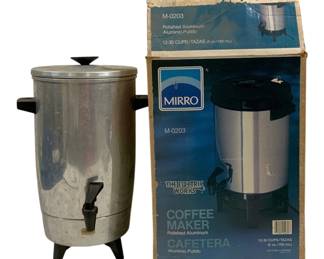 1716 - Mirro Polished Aluminum Coffee Maker w/ Box (Description): Mirro polished aluminum coffee maker, model  M-0203, with original box. This electric  percolator-style coffee maker features a  12-30 cup capacity (5 oz. per cup/150 mL).  The unit has a polished aluminum body with black plastic handles, spigot, lid knob, and  tripod base. Includes the original retail box  from The Electric Works line. Used as is  electric/electronic/mechanical item. No  guarantee all components, untested.