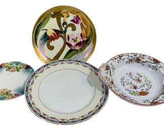 2355 - 4 Vintage Plates (Description): A lot of four vintage plates featuring  various decorative designs. The collection  includes an assortment of styles and  patterns, showcasing different ceramic  artistry.