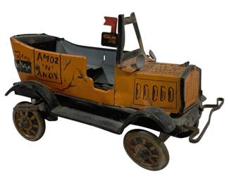 2078 - Tin Litho Metal Car 8"x6"x4" (Description): Tin lithographed metal car featuring Amos 'N'  Andy graphics. This vintage toy car  showcases classic tin litho construction with  printed details. Measures 8" x 6" x 4".
