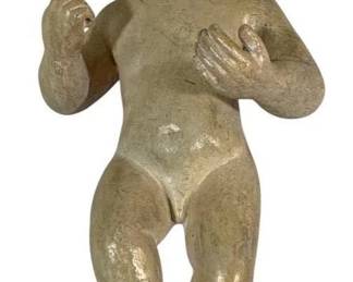 2463 - Baby Statue 14" (Description): A decorative baby statue measuring 14 inches  tall. The figure depicts a reclining infant  with painted facial features and a weathered  finish.