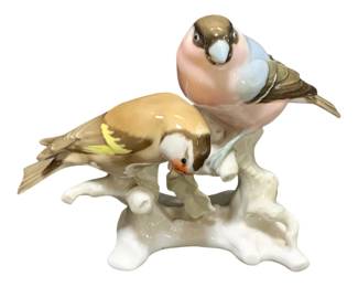 2310 - Hutschenreuther Bird Figurine 6"x8"x4" (Description): German ceramic figurine featuring a pair of  birds perched on a naturalistic branch.  Measures 6 inches by 8 inches by 4 inches.