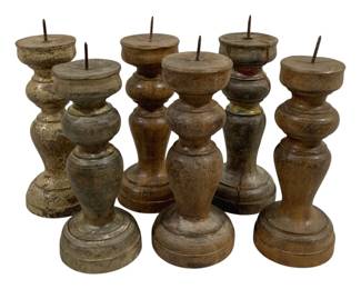 2470 - 6 Candle Prickets 9" Tall (Description): A lot of six candleholders measuring 9 inches  tall. These turned wooden pricket-style  candleholders feature varied patina and  weathered finishes.