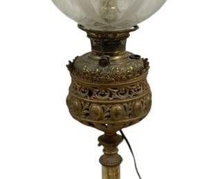 2101 - Vintage Banquet Lamp 29" (Description): Antique lamp measuring 29 inches in height.  The lamp features an ornate brass base with  decorative pierced metalwork and a clear  glass globe shade. Used as is electric/electronic/mechanical item. No guarantee all components, untested.