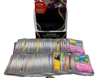 2382 - 300 Pokemon Cards w/ Box & Coin (Description): A lot of 300 Pokemon trading cards  accompanied by a Mega Evolution Pitch Black  storage box and a collectible Pokemon coin.