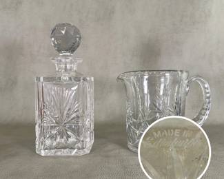 A vintage cut crystal square decanter with stopper, and a cut crystal water pitcher, both in the "Star of Edinburgh" pattern by Edinburgh Crystal, Scotland