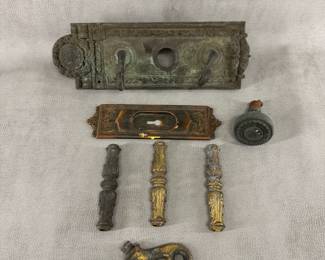 More pieces from the collection of antique bronze door hardware from a Cook County building, Seal of Cook County on the plates