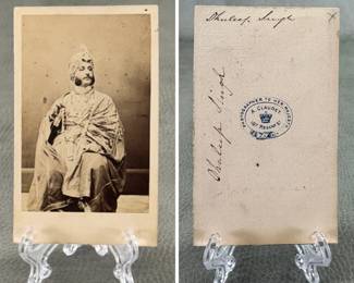 A rare albumen carte-de-visite (CDV) portrait of Maharaja Duleep Singh, the last Maharaja of the Sikh Empire. The photograph was taken circa 1864 by the famous French photographer and inventor Antoine Claudet (“Photographer to Her Majesty”) in London. (A pristine original copy of this exact CDV is preserved in the permanent collection of the National Portrait Gallery in London under reference number NPG x1506.)