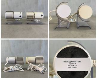 Two vintage Braun HL 70 personal desk fans, featuring a cream-colored cylindrical plastic body and a clear acrylic stand.